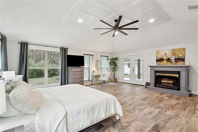 bedroom featuring ceiling fan, hardwood / wood-style flooring, access to outside, and french doors