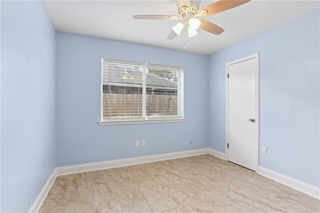 unfurnished room featuring ceiling fan