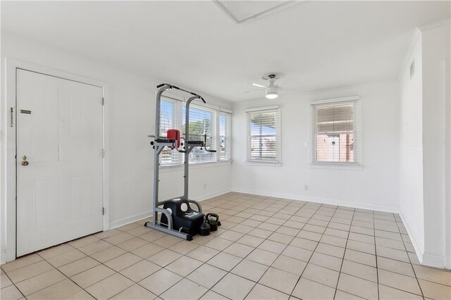 interior space with ceiling fan and light tile patterned floors