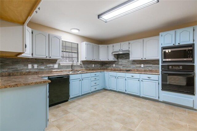 kitchen featuring black appliances, white cabinetry, sink, backsplash, and blue cabinetry