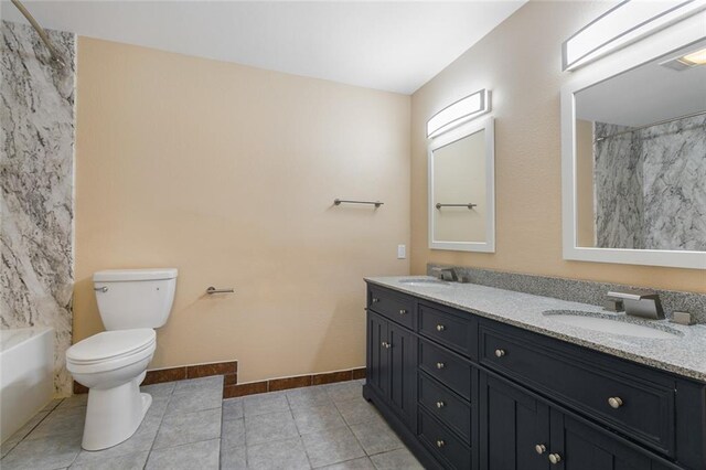 full bathroom featuring toilet, bathing tub / shower combination, and vanity