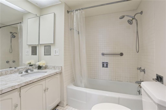 full bathroom with toilet, vanity, tile patterned floors, and shower / bath combo with shower curtain