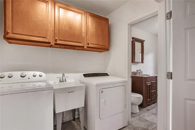 553 Crystal St, New Orleans, LA 70124 - laundry room with washing machine and clothes dryer, cabinet space, and a sink