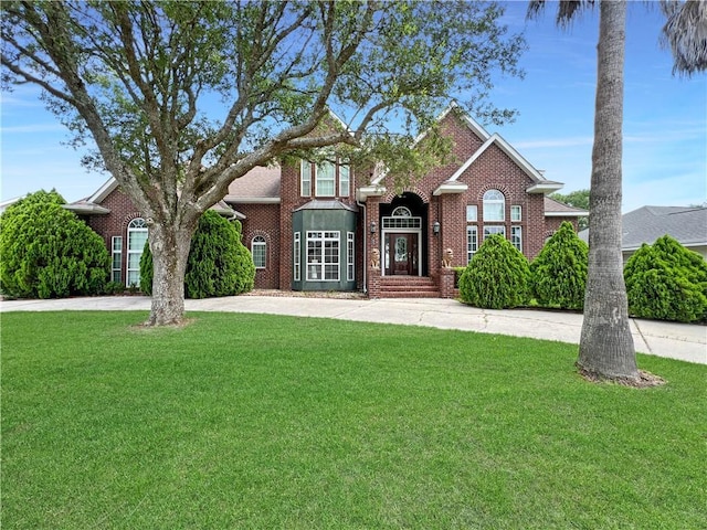 view of front of home with a front yard