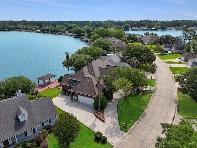 birds eye view of property featuring a water view