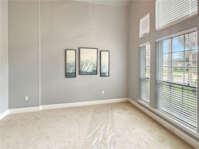 empty room with carpet flooring