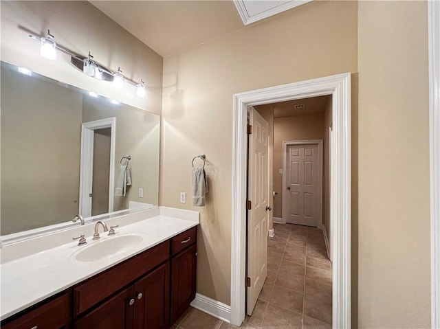 bathroom with vanity and tile patterned flooring