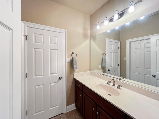 bathroom with vanity and tile patterned floors