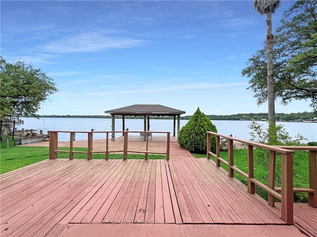 deck with a water view and a gazebo