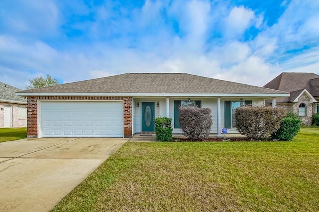 single story home with a front yard and a garage