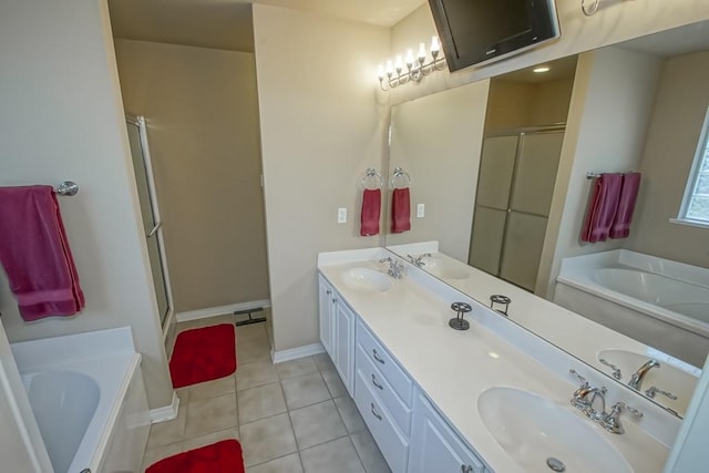 bathroom with tile patterned flooring, separate shower and tub, and vanity