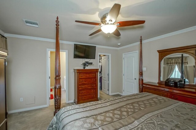 bedroom featuring light carpet, ceiling fan, and ornamental molding