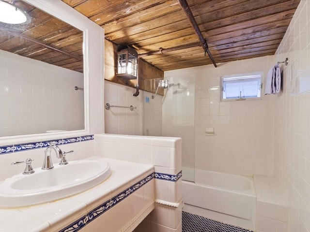 full bath featuring shower / washtub combination, tile walls, vanity, wooden ceiling, and tile patterned floors