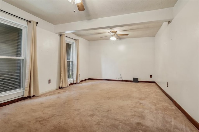 unfurnished room featuring carpet and ceiling fan