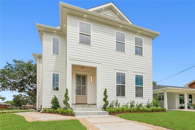 view of front of property with a front yard