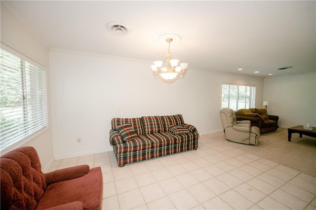 living room featuring ornamental molding, a chandelier, and light tile patterned flooring