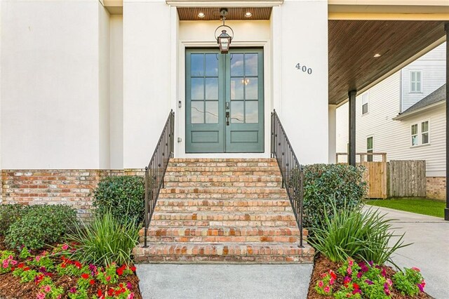 view of exterior entry with french doors