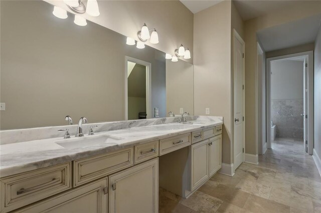 bathroom with toilet and vanity