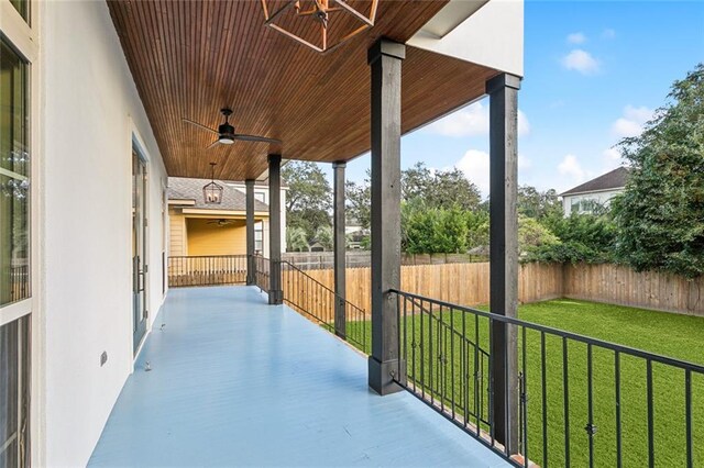 view of patio featuring ceiling fan