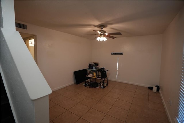 interior space featuring ceiling fan