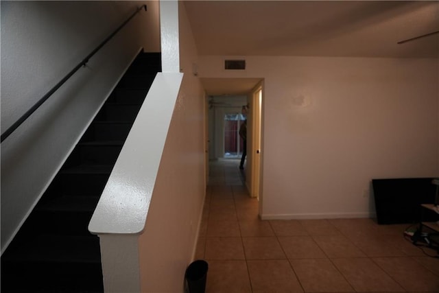 corridor with tile patterned floors