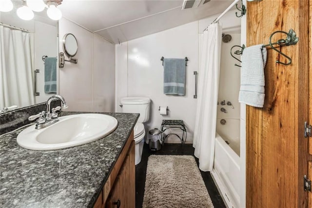 full bathroom featuring toilet, shower / bath combo, and vanity