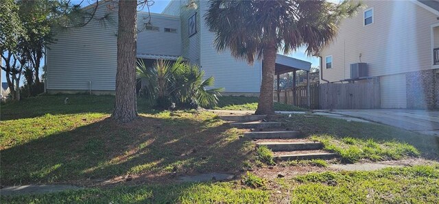 view of yard featuring central AC