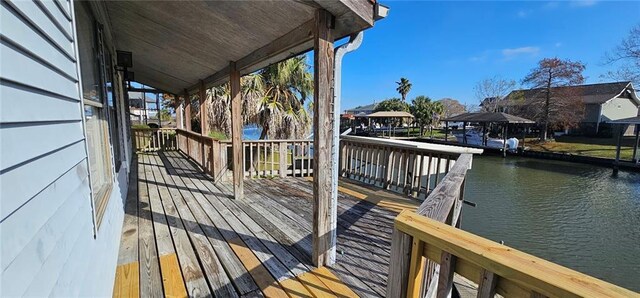 deck featuring a water view