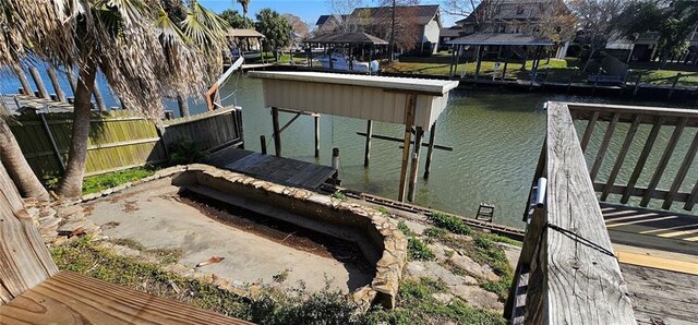 dock area featuring a water view