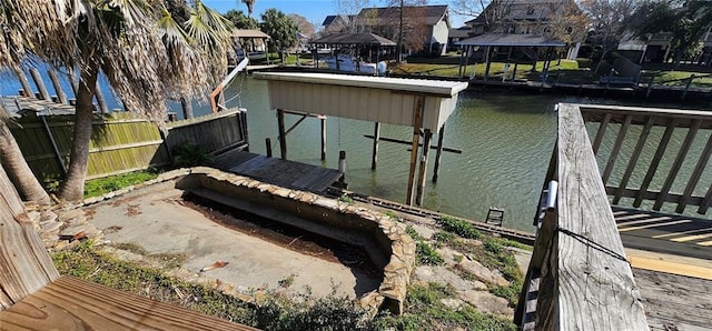 4410 San Remo Rd, New Orleans, LA 70129 - dock with boat lift, a water view, and a residential view
