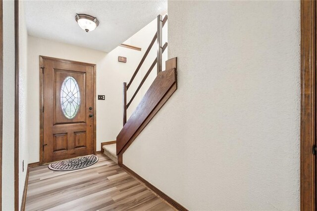 entryway with light wood-type flooring