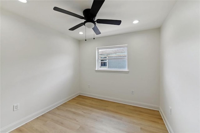 unfurnished room with ceiling fan and light wood-type flooring