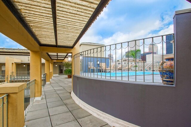 view of patio with a community pool