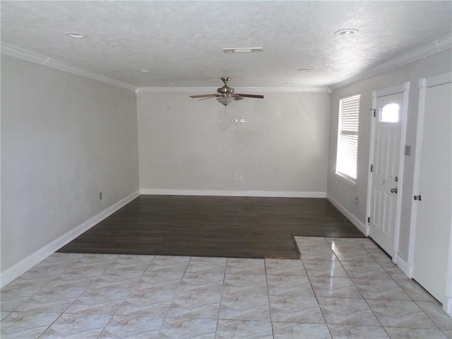 entrance foyer with ceiling fan, crown molding, and a textured ceiling