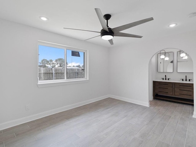 unfurnished bedroom with ceiling fan