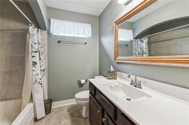 full bathroom with toilet, vanity, and shower / tub combo with curtain