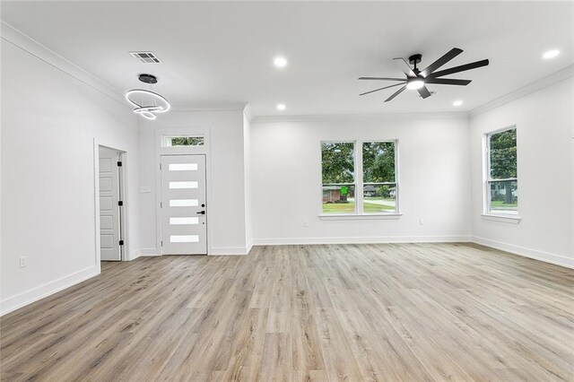 entrance foyer featuring crown molding, light hardwood / wood-style floors, and ceiling fan