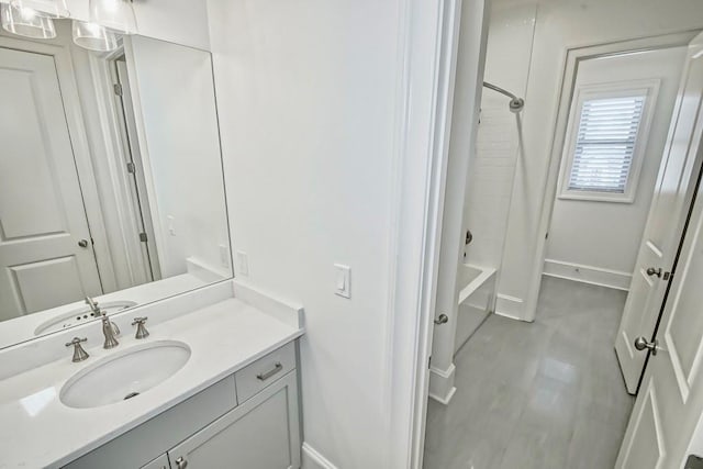 bathroom with shower / bath combination and vanity