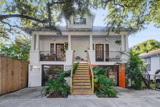 view of front of home featuring french doors and a porch