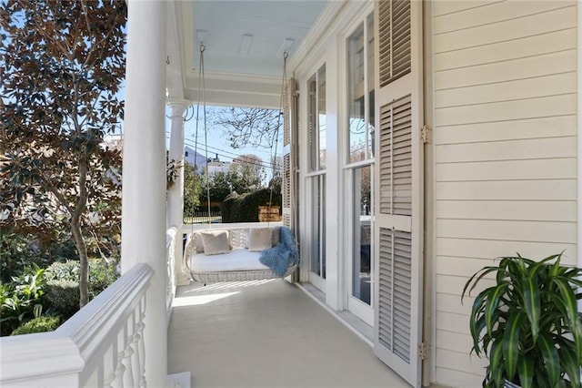 balcony featuring covered porch