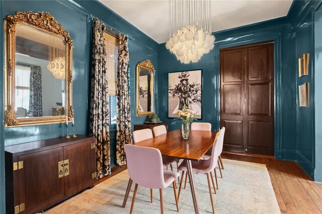 dining room featuring light hardwood / wood-style floors