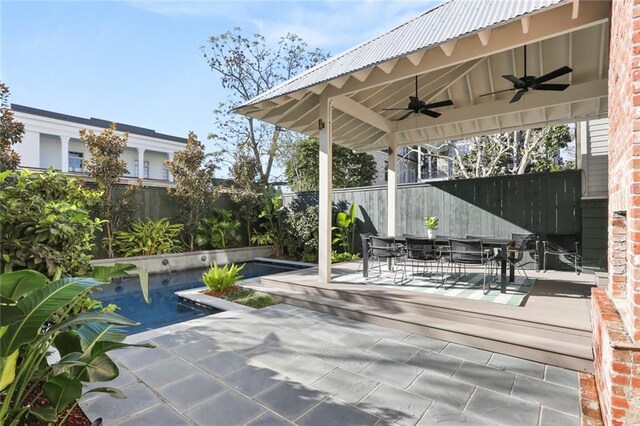 view of patio with ceiling fan