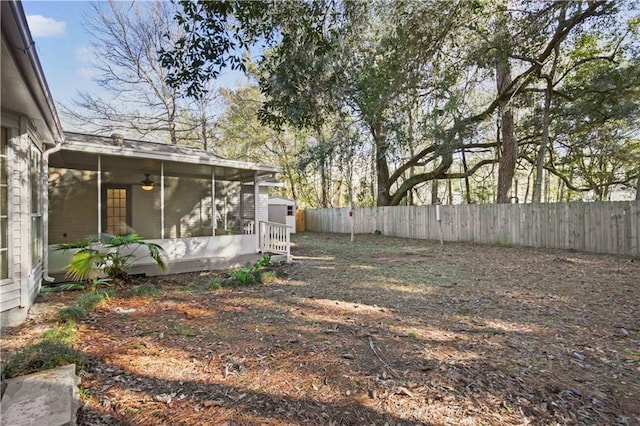 view of yard featuring a sunroom