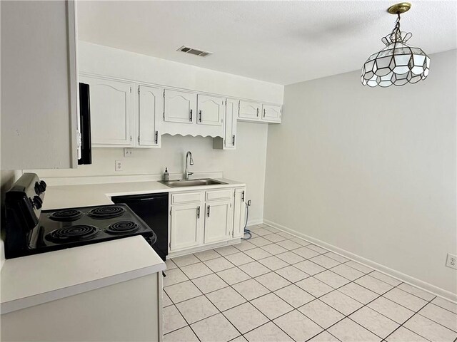 kitchen with electric range, sink, white cabinetry, hanging light fixtures, and dishwashing machine