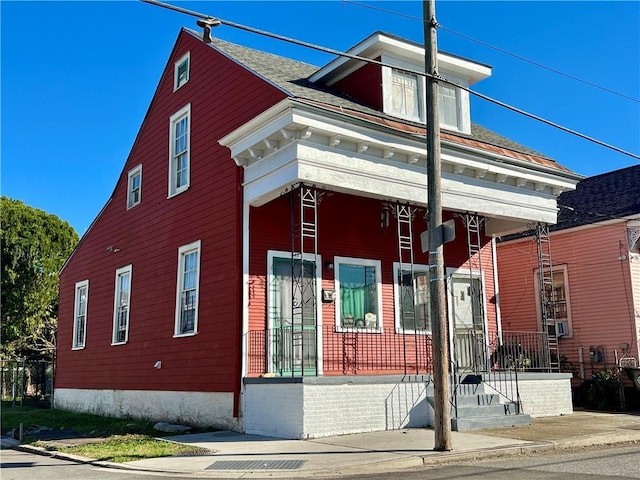 view of front of home with cooling unit