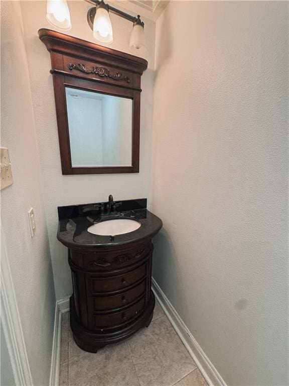 bathroom with vanity and tile patterned flooring