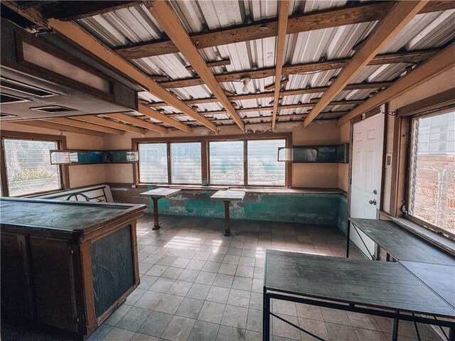 interior space with light tile patterned floors