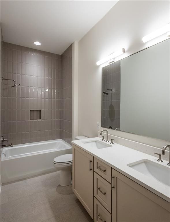 5044 Twin River Pl, Covington, LA 70433 - bathroom with toilet, double vanity, bathtub / shower combination, and recessed lighting