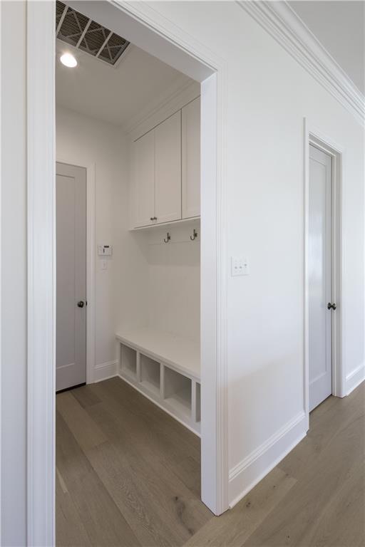 5044 Twin River Pl, Covington, LA 70433 - mudroom with light wood-style floors and baseboards