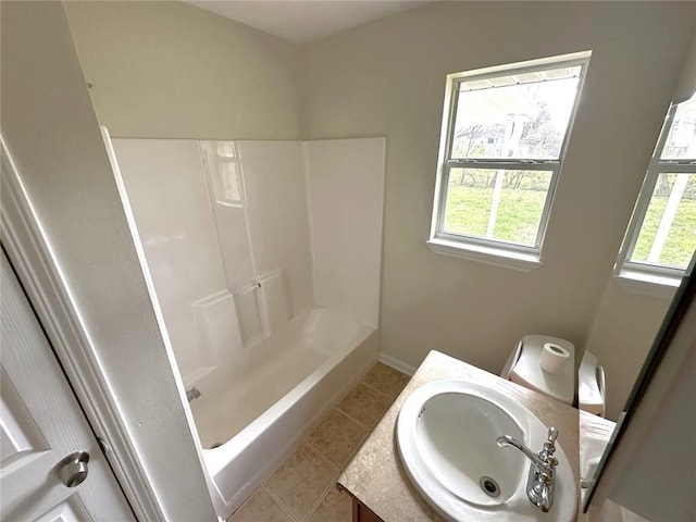 bathroom with vanity, tile patterned flooring, and bathing tub / shower combination